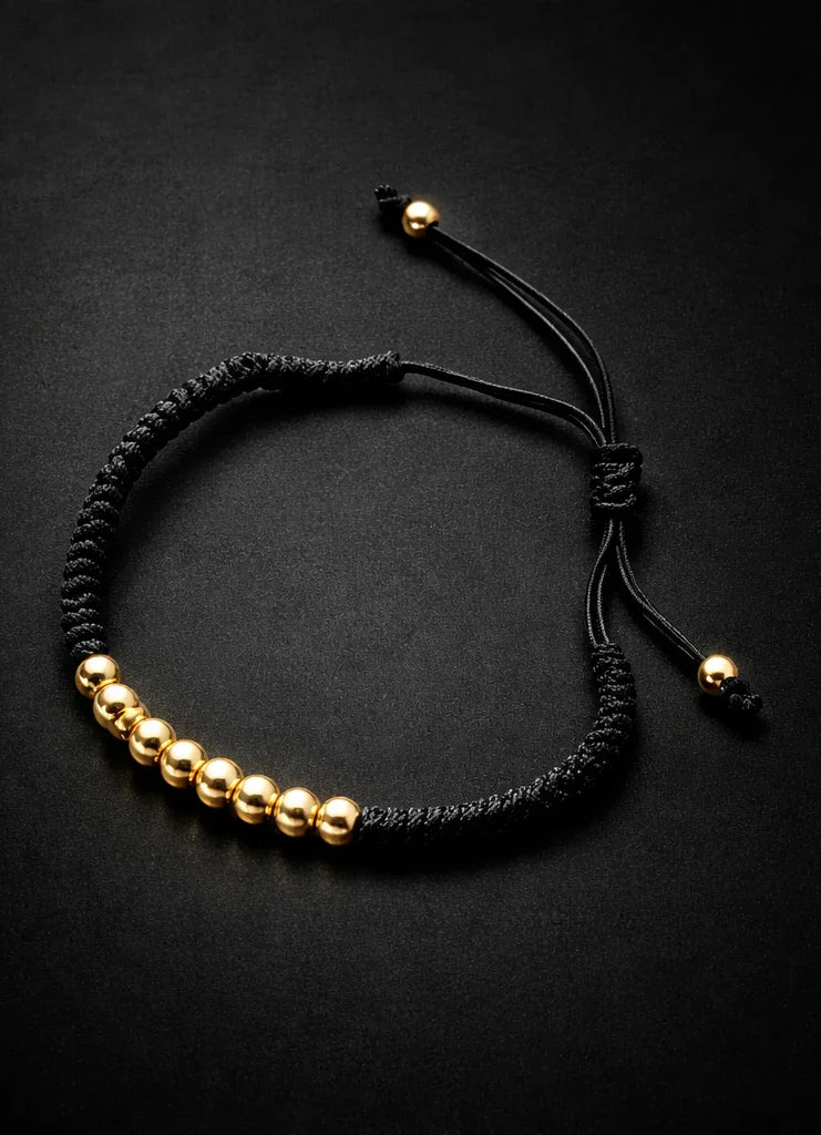 Brățară Neagră cu Mărgele Aurii Unisex – Streetwear Minimal Ajustabilă
